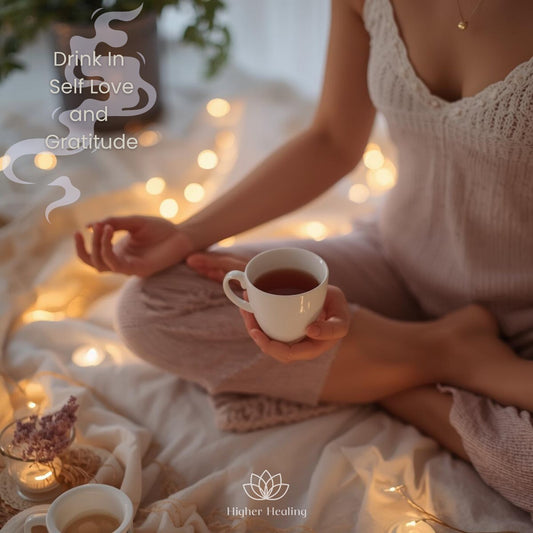 Drink In Self Love and Gratitude guided meditation - a woman sitting cross-legged holding a warm cup.