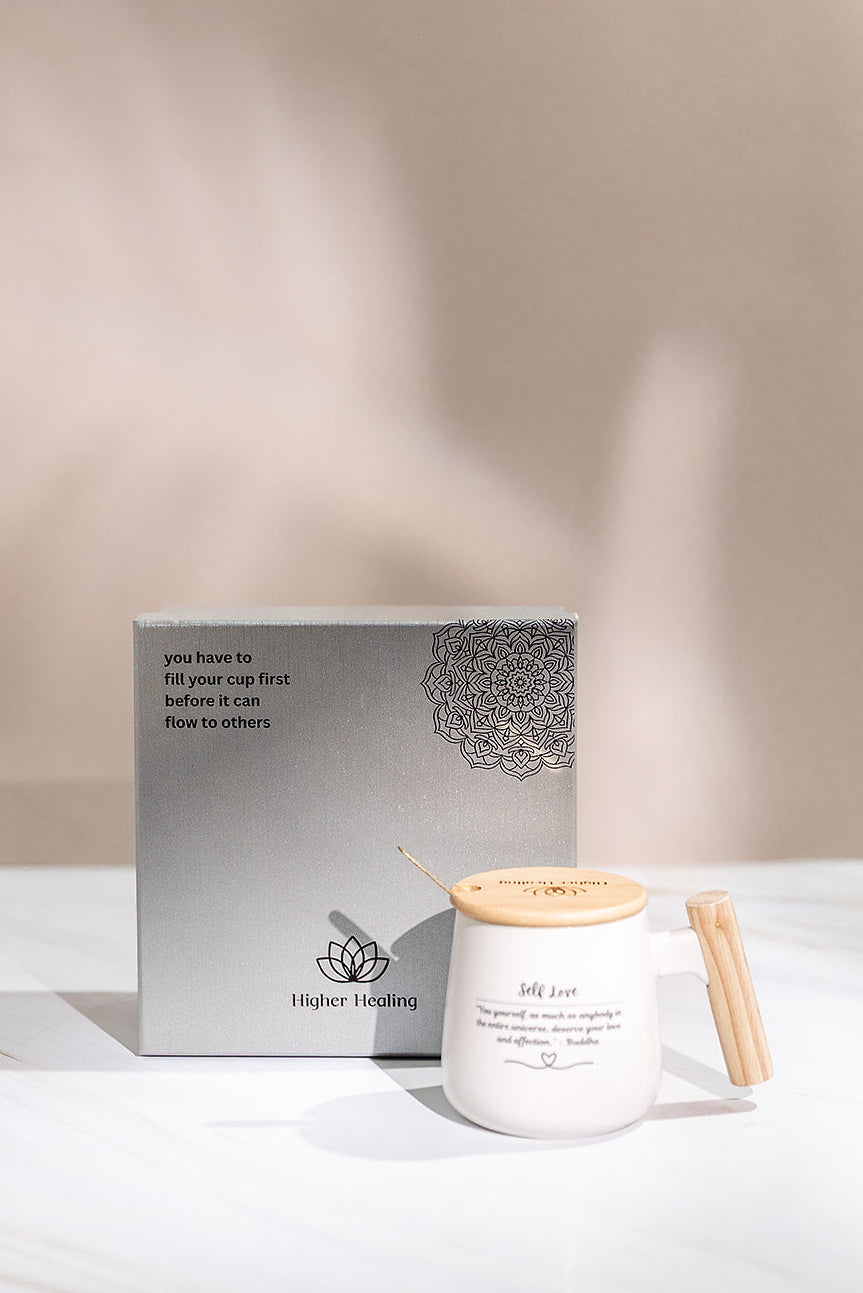 A boxed self love mug with a bamboo lid.
